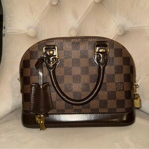 Alma bb Damier